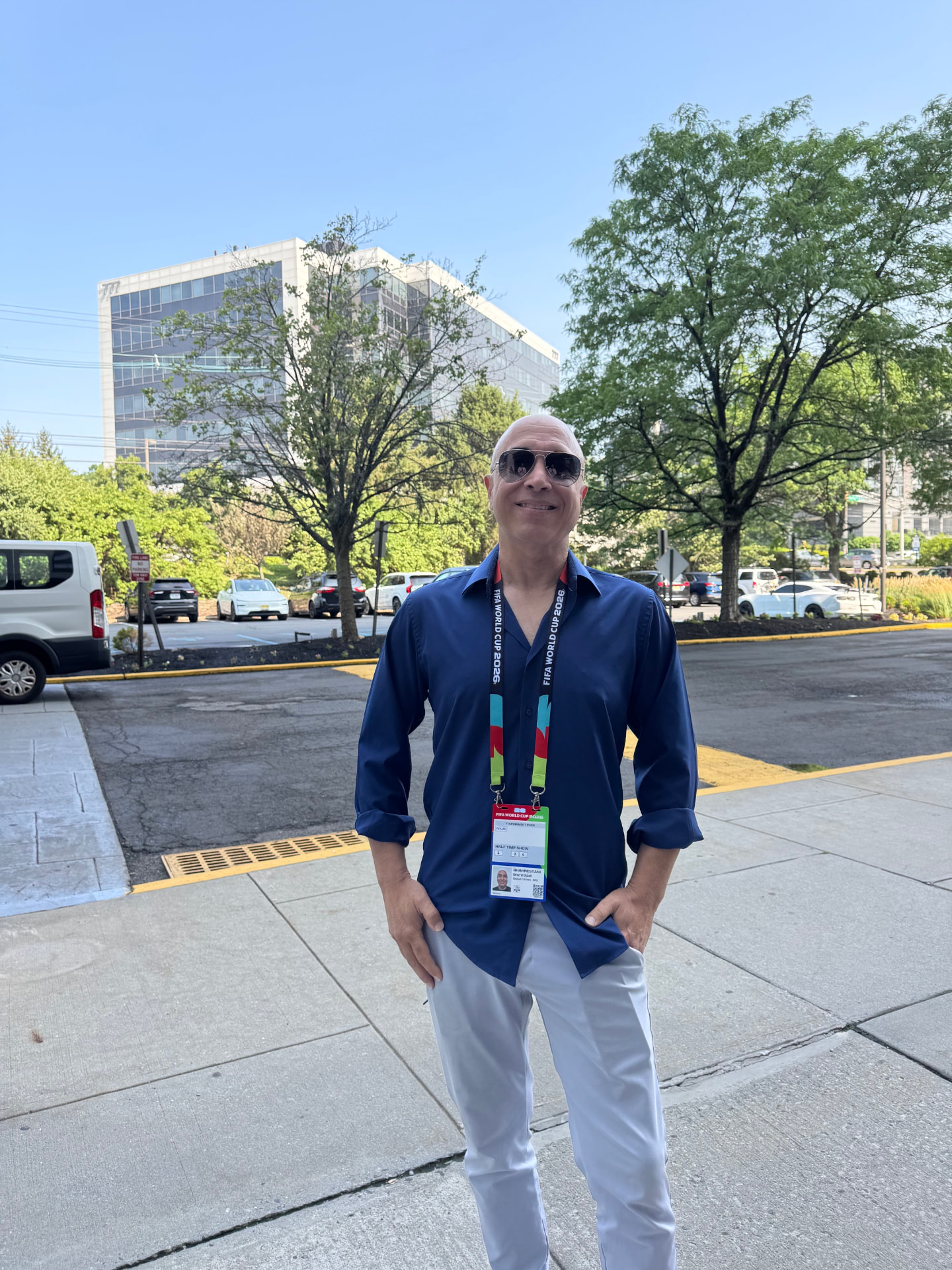 Mike Shahrestani standing outdoors at an industry event